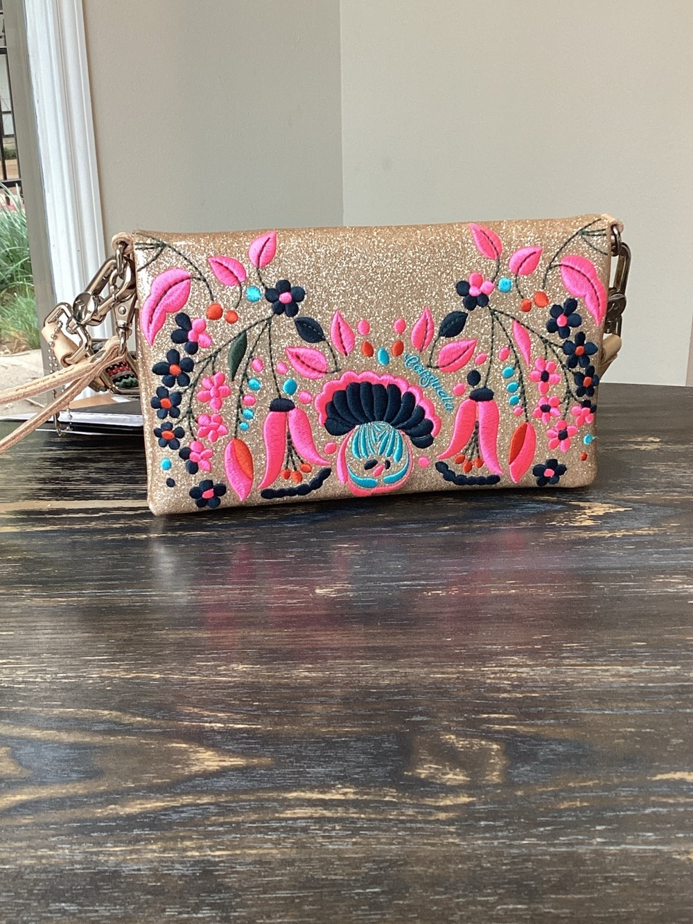 Consuela Lyla Uptown Gold Sparkle Crossbody with Pink and Navy Floral Embroidery